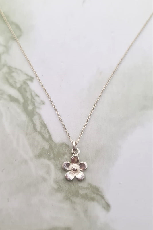Handmade Sterling Silver daisy pendant.